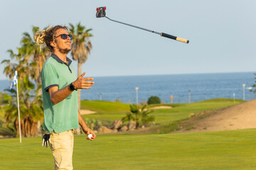 Unique golfer with dreadlocks enjoying a seaside golf course