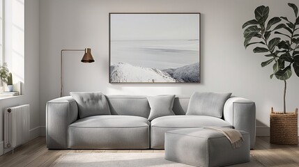A sleek arm sofa in muted tones with a minimalist hanging poster mockup above, creating a serene living space.