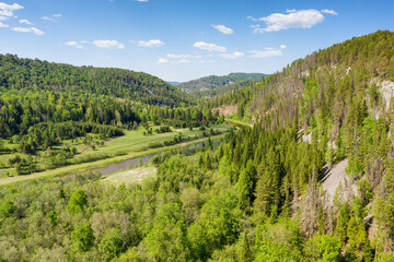 The Southern Urals in summer, the Zilim River in the Kultamak natural boundary. Aerial view.
