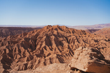 Arid desert rock formations in Devil's Gorge in San Pedro de Atacama, Chile