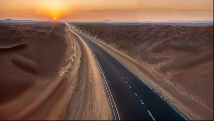 Fototapeta premium Asphalt road in the desert in Saudi Arabia at sunset, roads and streets of Saudi Arabia, highway, desert nature, nature wallpaper