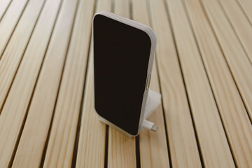 Smart mobile phone wear matte white case and cable case with phone standing function.