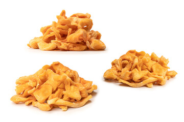 Dried melon slices isolated on a white background.