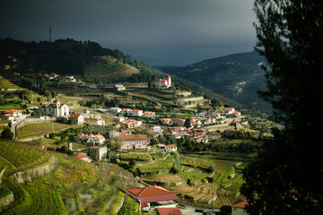 View of a village in the hills of the Douro Valley at dawn, Portugal. - obrazy, fototapety, plakaty