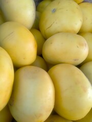 yellow melon on a market stall