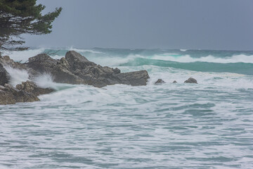 waves crashing on rocks