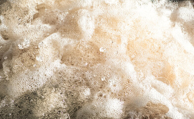 Natural background of rough water foam splashing in a river. - 757462477