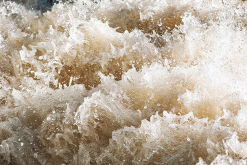 Natural background of rough water foam splashing in a river. - 757462489