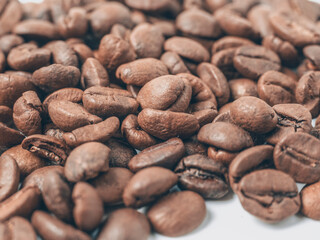 Close-up of roasted coffee beans. Can be used as a food background. Macro, top view, flat lay