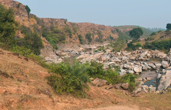 rustic nature landscape with primitive, rock formations in river bed of Telwa and nearby Dharara waterfalls in Simultala, Bihar. This landscape is part of Chota Nagpur Plateau.