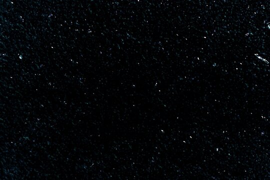 Cosmos background texture with shapes resembling stars objects in space