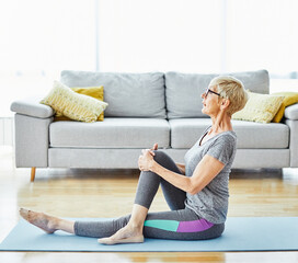 senior active exercise training sport fitness home stretching woman elderly pilates gym yoga indoor...