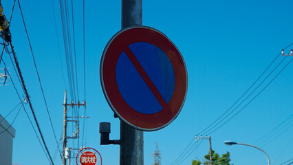 No parking sign on electric pole in Japanese street