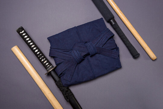 Minimalism in Martial Arts &mdash; Hakama and Training Weapons on Neutral Gray