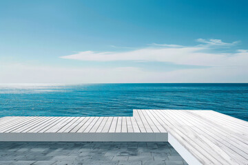 A beautiful blue ocean with a white dock and a wooden boardwalk, water is calm and the sky is clear