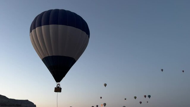 Balloons lifting at dawn in Cappadocia, jk01