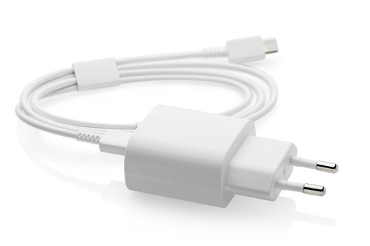 Charger block with white wire isolated on white background