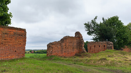 Several surviving fragments of a brick wall on the territory of the Saburovsky fortress, in Russia, the village of Saburovo