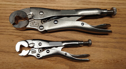 locking nut pliers especially useful in automotive engine repair