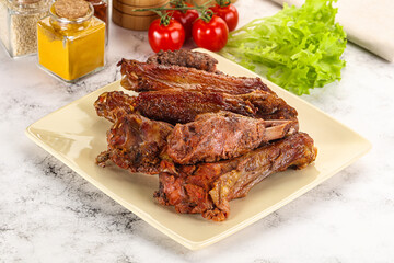 Roasted duck wings with sauce