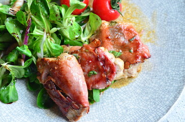 beautiful background of food served on a rustic plate, italian cuisine, grilled veal meat with...