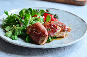 Saltimbocca. Veal schnitzel with sage and Parma ham. Italian specialty. close up view, yummy