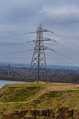 power lines in the field and town view