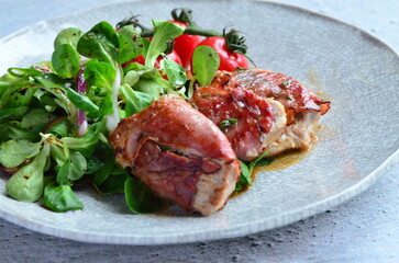Saltimbocca. Veal schnitzel with sage and Parma ham. Italian specialty. close up view, yummy