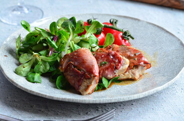 Saltimbocca. Veal schnitzel with sage and Parma ham. Italian specialty. close up view, yummy