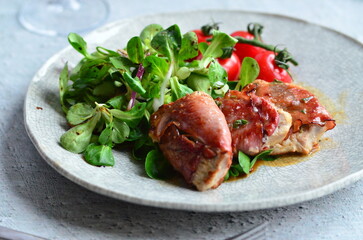 Saltimbocca. Veal schnitzel with sage and Parma ham. Italian specialty. close up view, yummy