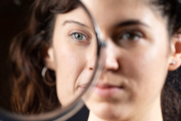 Woman's Reflection in Mirror with Distorted Perception