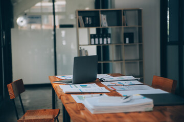 Office workplace with laptop and smart phone on wood table