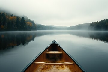 Canoeing on a serene, glassy lake photography - obrazy, fototapety, plakaty