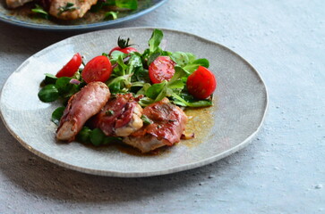 Saltimbocca. Veal schnitzel with sage and Parma ham. Italian specialty. close up view, yummy