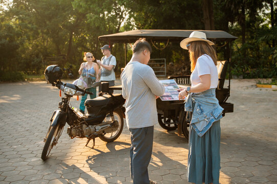 Tourists exploring local attractions at a sunny destination