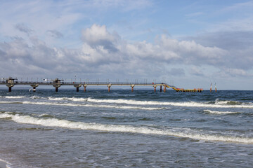 Miedzyzdroje pier, long wooden pier from the beach deep into the Baltic Sea, Miedzyzdroje, Poland