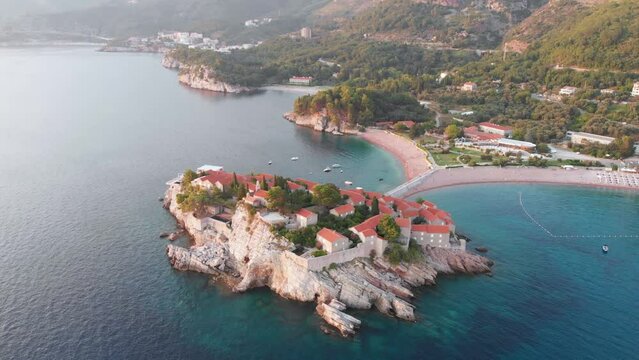 Amazing drone video of the small old town of Sveti Stefan and resort Petrovac in Montenegro.
