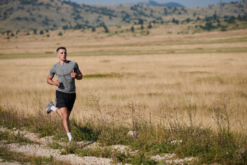 Fototapeta na wymiar Determined Stride: Athletic Man Embarks on Marathon Preparation with Resolve.