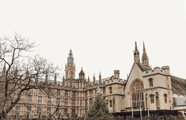 The Palace of Westminster is the meeting place of the House of Commons and the House of Lords, the two houses of the Parliament. Space for text, Selective focus. - obrazy, fototapety, plakaty