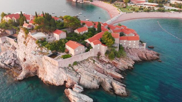Amazing drone video of the small old town of Sveti Stefan and resort Petrovac in Montenegro.