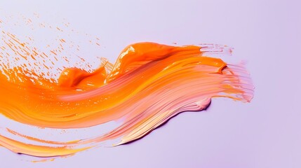 Abstract acrylic brush stroke. Bright orange paint smear isolated on white background.