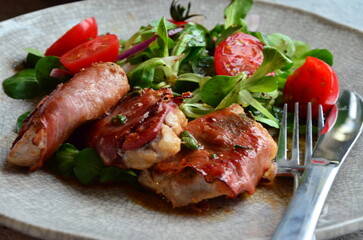 Saltimbocca. Veal schnitzel with sage and Parma ham. Italian specialty. close up view, yummy