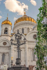 Church of the Resurrection decorated with a flower garland for Easter
