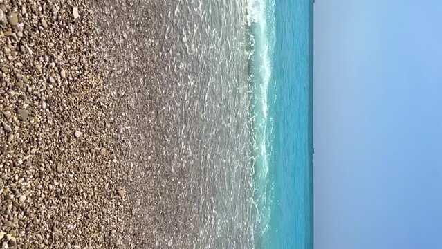 View of the amazing Oludeniz beach and the Blue Lagoon, the best beach in Turkey, Fethiye. Kidrak Beach. Mediterranean bays with blue water. Oludeniz Lagoon. Turkey. 4K