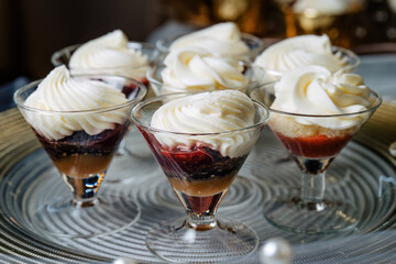 Italian strawberry tiramisu dessert with mascarpone and whipped cream.