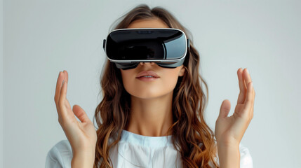 Happy young woman wearing virtual reality goggles on white background. Future technology concept.