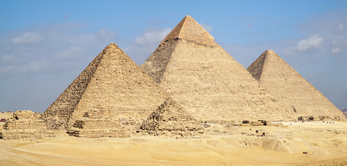 Fototapeta na wymiar Giza Pyramid Complex. Giza Necropolis in Cairo Egypt. Khufu (Cheops or the Great Pyramid), Khafre and Menkaure.