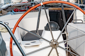 interior of a beautiful yacht, steering wheels and control levers.
