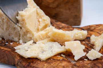 Traditional italian food - 22 months aged in caves Italian parmesan hard cheese from...