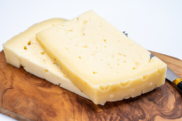 Fresh Asiago cow's milk cheese, from Asiago in Italy, used in panini or sandwiches or melted on variety of dishes, classified as a Swiss-type Alpine cheese